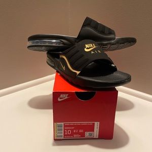 NIKE AIR SLIDES. Women’s 10/ Men’s 8.5. Black and gold! NWT!